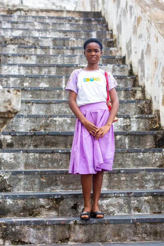 A pupil on the castle's stone stairway
