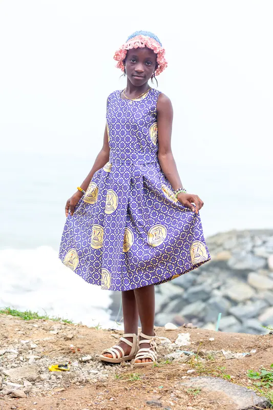 A pupil on the rocky shore
