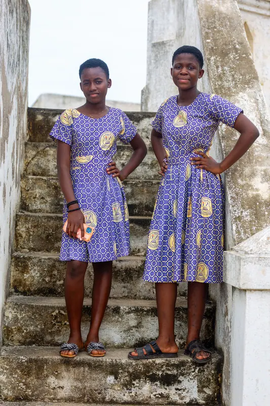 Two pupils on the castle stairway